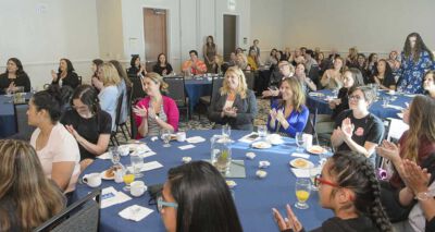 Women at a women's leadership conference